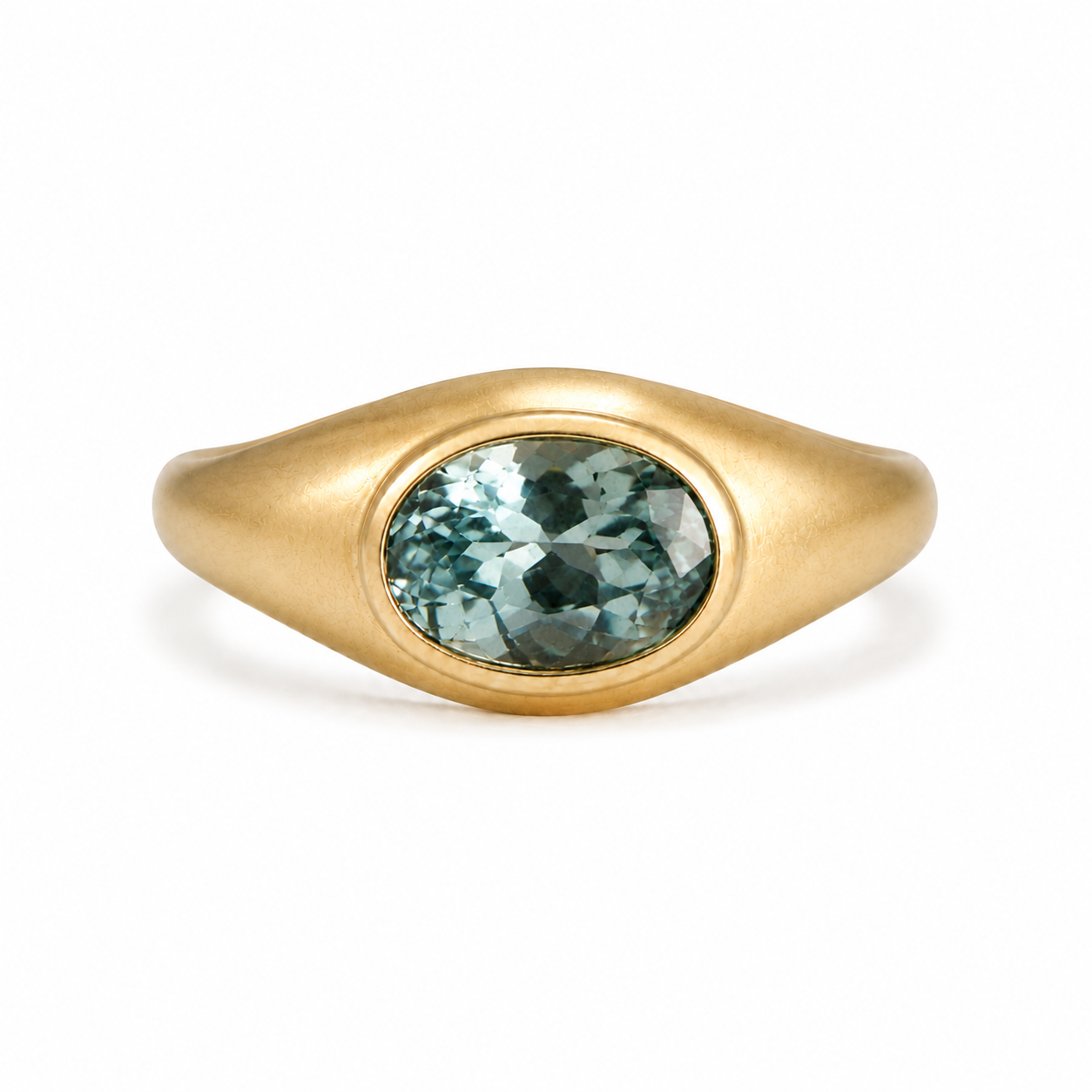 Relic Sapphire ring in satin-finish 14K gold with an oval teal sapphire, front view